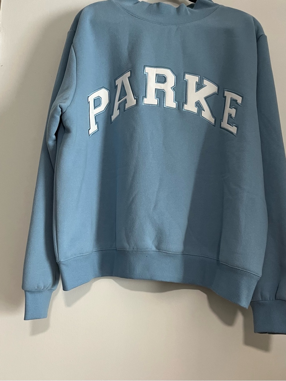 Parker Light Blue Crewneck Sweater with White Appliqué